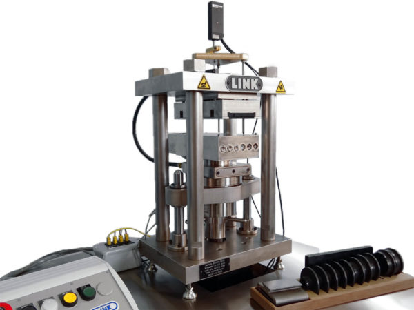 Shown here, the Model 1620H Compressibility Test Machine provides a complete workstation to evaluate the compressibility of friction materials at ambient and elevated temperatures up to 600 °C.