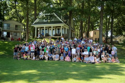 A treasured tradition at LINK for over 60 years, the LINK annual picnic connects LINK colleagues outside of the office and brings together family and friends. This is a group photo.