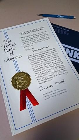 Link Engineering has been awarded a patent on its Low Friction Tailstock Assembly. This is a photo of the certificate.